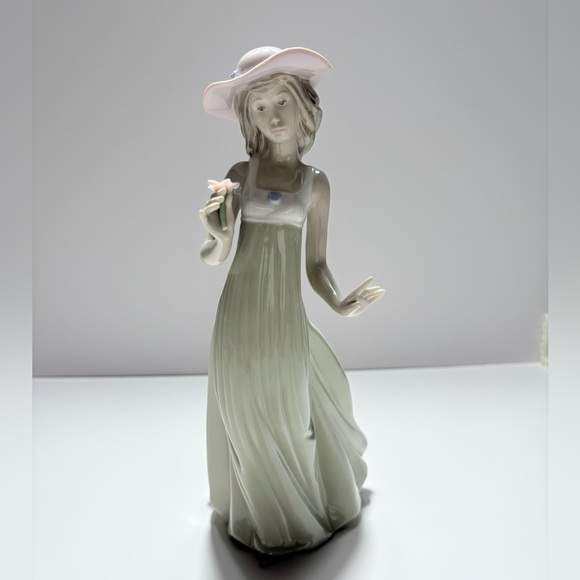 NAO by Lladro Porcelain Figurine Titled “Gentle Breeze”-Handcrafted in Spain